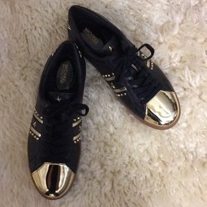 Michael Kors black and gold tennis shoes